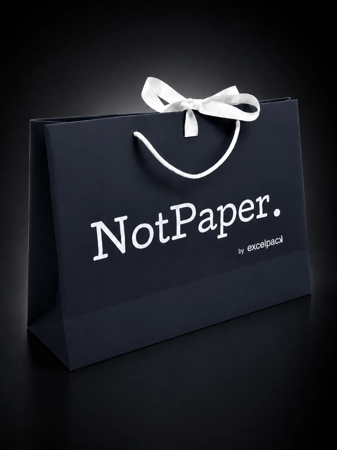 Prototype sac NotPaper noir avec logo blanc et ruban blanc